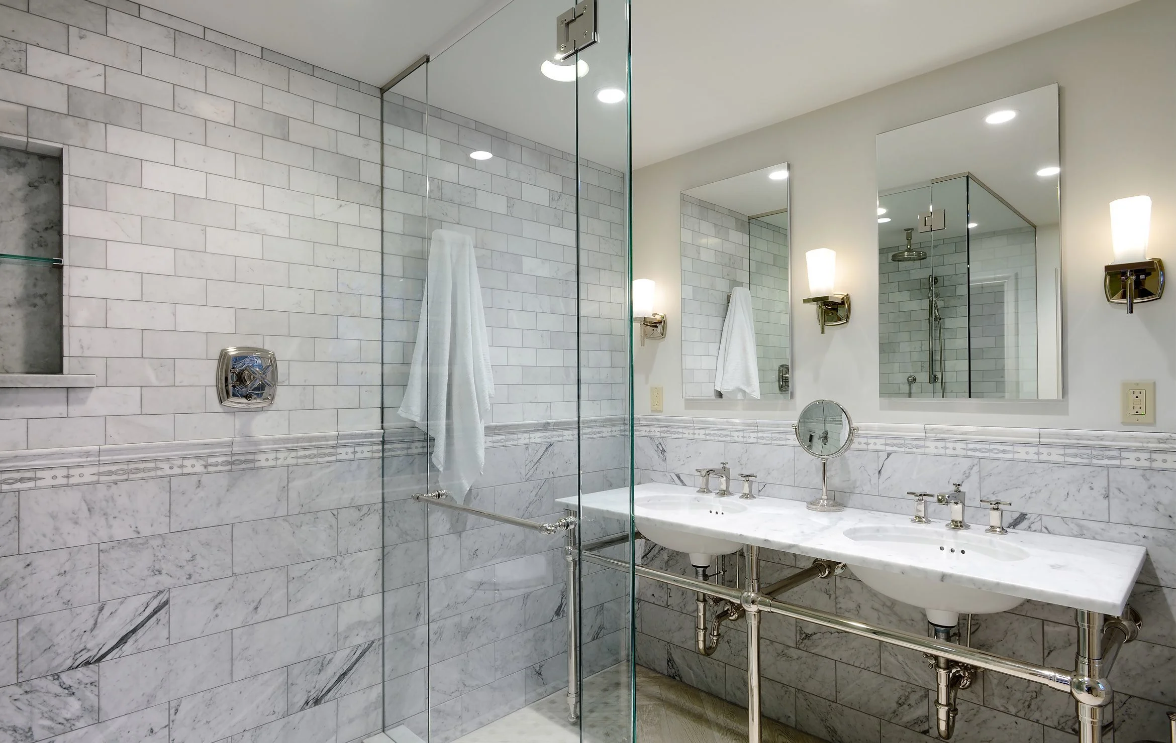 Completed bathroom with a tiled walk-in shower and stone vanity top